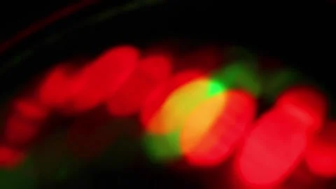 Seamless loop of blurred rotating colorful LED lights Stock Footage 141280298