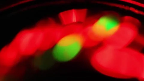 Seamless loop of blurred rotating colorful LED lights Stock Footage 141280630