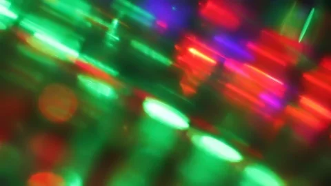 Seamless loop of blurred slowly tilting colorful LED lights Stock Footage 127371212