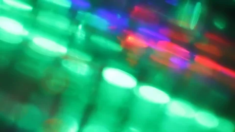 Seamless loop of blurred slowly tilting colorful LED lights Stock Footage 127371635
