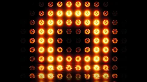 Seamless Loop of Bright Golden Stage Lights with Water Reflection Stock Footage 313416287