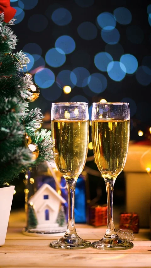 Seamless Loop Of Champagne Bubbles Beside Christmas Tree. Dark Night Beautifu Stock Footage 96356087