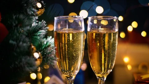 Seamless Loop Of Champagne Bubbles Beside Christmas Tree. Dark Night Beautifu Stock Footage 96356282