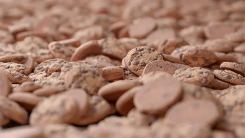 Seamless Loop of chocolate chip cookies. Smooth camera with bokeh. Stock Footage 239024438