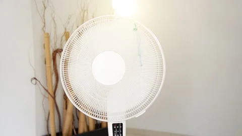 Seamless loop - Closeup on electric floor standing fan in action Stock Footage 132250603