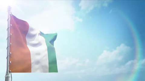 Seamless Loop Of Cute dlvoire Flag front view In sunset blue sky Stock Footage 296934716