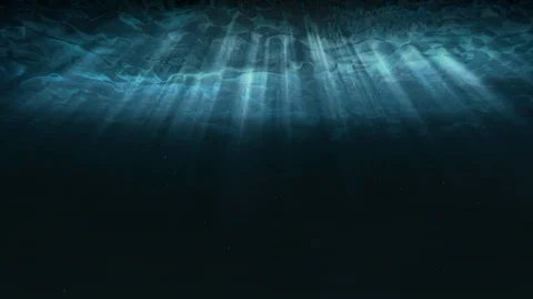 Seamless loop deep blue underwater with sunlight rays shining through ocean. Stock Footage 123634811