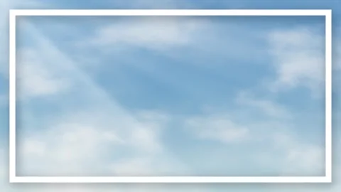 Seamless Loop of Drifting White Clouds in a Bright Blue Sky Stock Footage 339044154