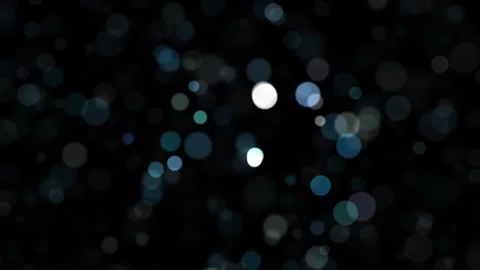 Seamless loop glow circle bokeh on black background 動画素材 337661496