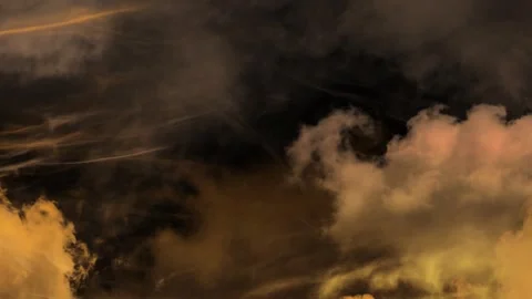Seamless loop golden clouds moving slowly across a dark night sky Stock-Footage 348271110