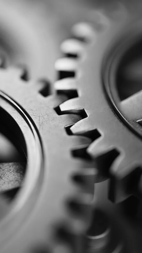 Seamless loop of interlocking metal gears in rotation. Stock Footage 313288625