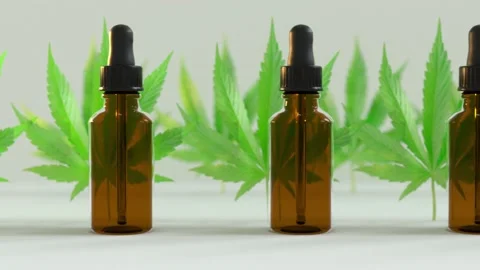 Seamless Loop of A lot of CBD oil bottles with marijuana or cannabis oil leafs Stock Footage 149011961