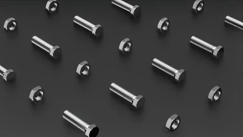 A seamless loop of metal bolts and nuts arranged in a row background. Stock Footage 265248976