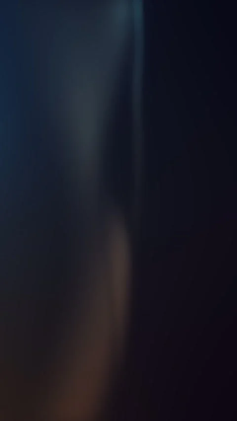 Seamless loop of a minimal vertical light beam, soft blue gold gradient on .. Stock Footage 340143866