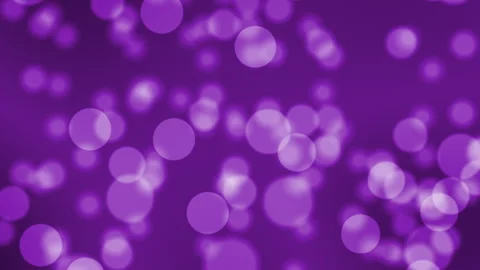Seamless loop of purple bokeh circles on a dark violet background Stock Footage 345145337