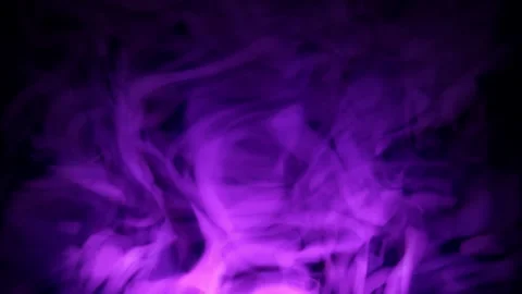 Seamless loop screensaver with pink purple smoke on a black background Stock Footage 284905267
