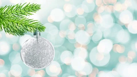Seamless loop - Silver christmas ball hanging from a branch, moving holiday l Video stock 81655269