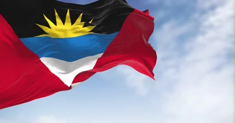 Seamless loop in slow motion of Antigua and Barbuda national flag waving Stock Footage 238080160