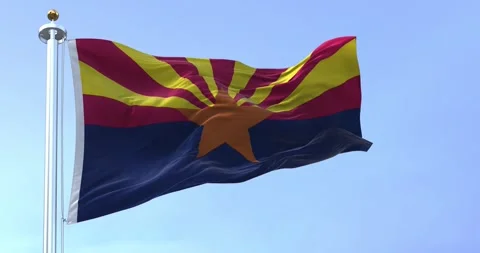 Seamless loop in slow motion of Arizona state flag waving on a clear day Stock Footage 241415643