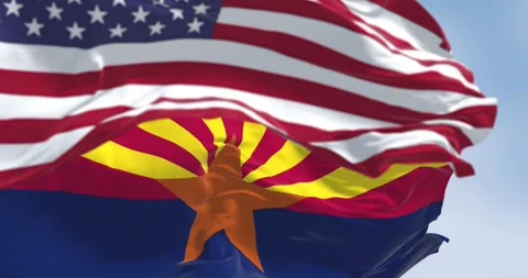 Seamless loop in slow motion of Arizona and United States flags waving Video stock 243090997