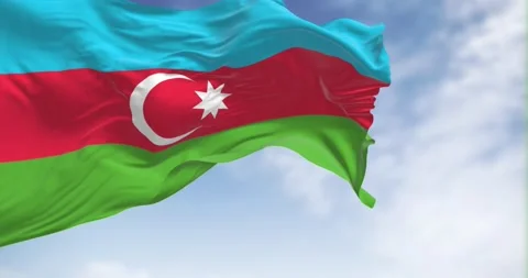 Seamless loop in slow motion of Azerbaijan flag waving on a clear day Stock Footage 237158945