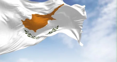 Seamless loop in slow motion of Cyprus national flag waving on a clear day Stock Footage 238828007