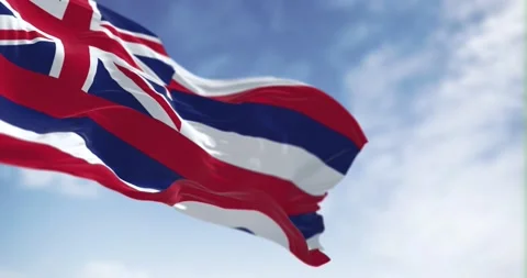 Seamless loop in slow motion of Hawaii flag waving on a clear day Video stock 239639507