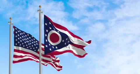 Seamless loop in slow motion of the Ohio and US flags waving on a clear day 스톡 동영상 236625742