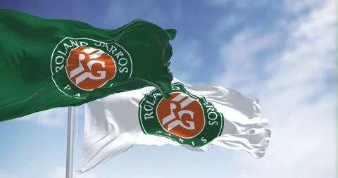 Seamless loop in slow motion of the Roland-Garros flags waving Stock Footage 236469709