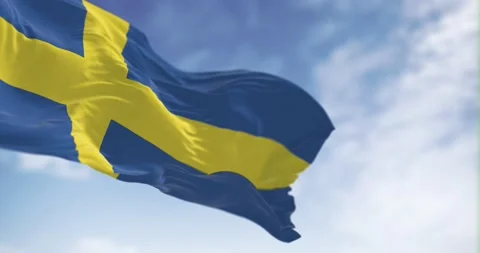 Seamless loop in slow motion of Sweden flag waving on a clear day Stock Footage 239421021