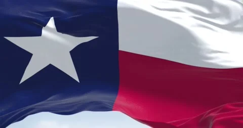 Seamless loop in slow motion of the Texas state flag fluttering in the wind 스톡 동영상 236625787