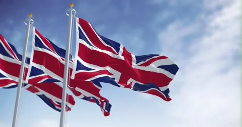 Seamless loop in slow motion of three national flags of the United Kingdom .. Stock Footage 235821185