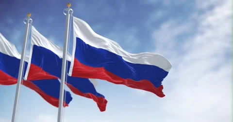 Seamless loop in slow motion of three Russia flags waving on a clear day Stock Footage 240746667