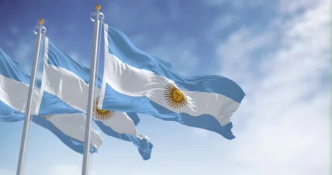 Seamless loop in slow motion of Three Argentine flags waving on a sunny day. Stock-Footage 240939173