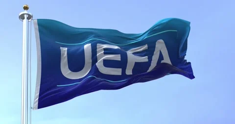 Seamless loop in slow motion of UEFA flag waving on a clear day Stock Footage 237692536