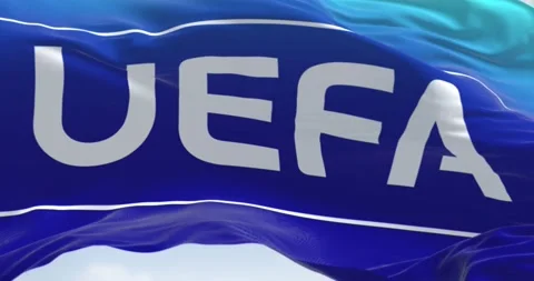 Seamless loop in slow motion of UEFA flag waving Video stock 238520494