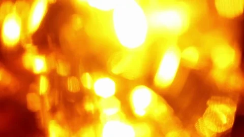 Seamless loop of soft focused orange LED lights blinking Stock Footage