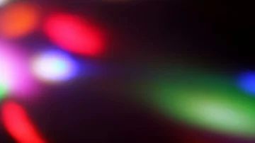 Seamless loop of soft focused spinning LED lights Stock Footage 85681286