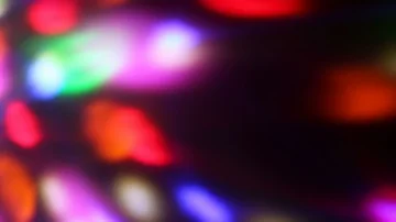 Seamless loop of soft focused spinning LED lights Stock Footage 85681305