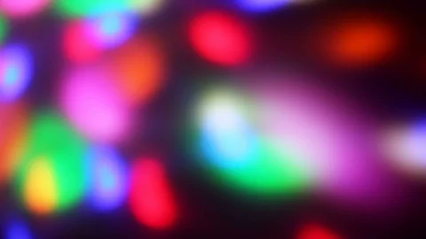 Seamless loop of soft focused spinning LED lights Video stock 85681487