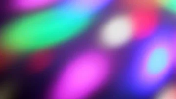 Seamless loop of soft focused spinning LED lights Video stock 85682178