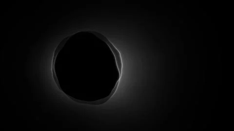 Seamless loop solar eclipse with glowing white corona in dark sky Stock Footage 348270792