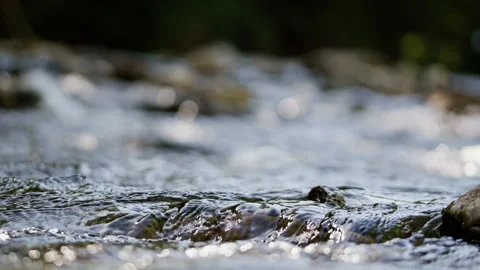 Seamless loop of sparkling rapids with bokeh highlights Vidéo 345730422