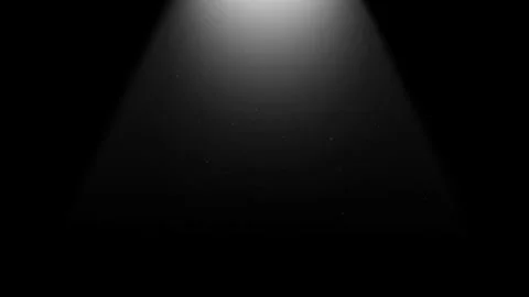 Seamless loop spotlight beam with floating dust particles on black background Stock Footage 348270857