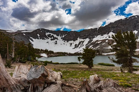Seamless loop of threatening storm over alpine lake Stock Footage 115189498