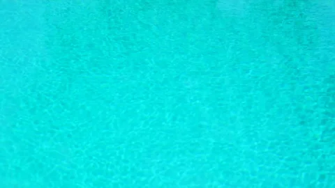 Seamless loop, turquoise blue ripped swimming pool water background Video stock 88356999