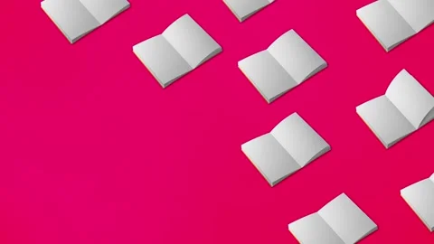 Seamless loop video. Book page flipping on pink background. Concept Видео 196210061