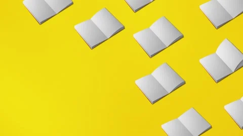 Seamless loop video. Book page flipping on yellow background. Concept  動画素材 196210089