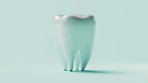 Seamless loop video. Closeup clean tooth rotation on turquoise background. White Stock Footage 195632649