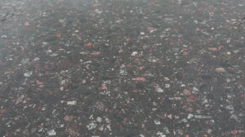 Seamless loop wet asphalt surface with various colored stones and texture b.. Stock Footage 319437908